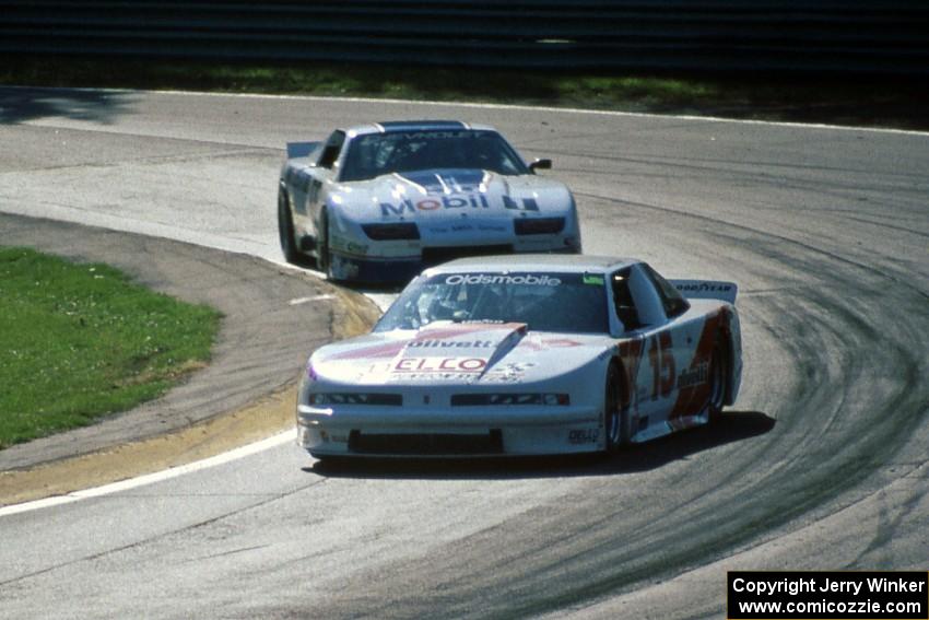 Chris Kneifel's Olds Cutlass Supreme and Bob Sobey's Chevy Camaro