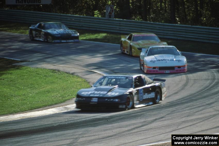 Irv Hoerr's Olds Cutlass Supreme ahead of the Chevy Camaros of Steve Petty, Les Lindley and Jack Baldwin