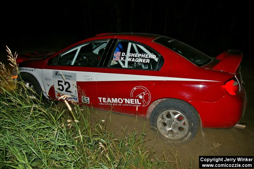 Doug Shepherd / Karen Wagner power out of a left-hander on SS6 in their Dodge SRT-4.