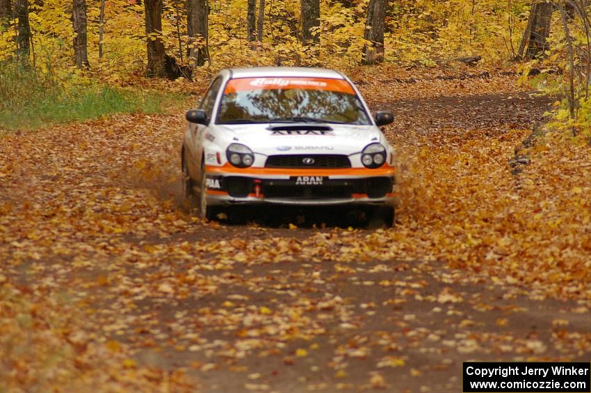 The Pat Moro / Mike Rossey Subaru WRX drifts through a sweeper near the finish of SS2, Beacon Hill.