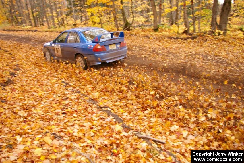 Dmitri Kishkarev / Kim DeMotte come into the finish of SS2, Beacon Hill, in their Mitsubishi Lancer Evo IV.