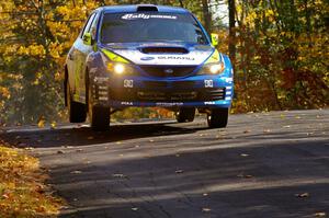 Travis Pastrana / John Buffum catch a little air over the midpoint jump on Brockway 1, SS13, in their Subaru WRX STi.