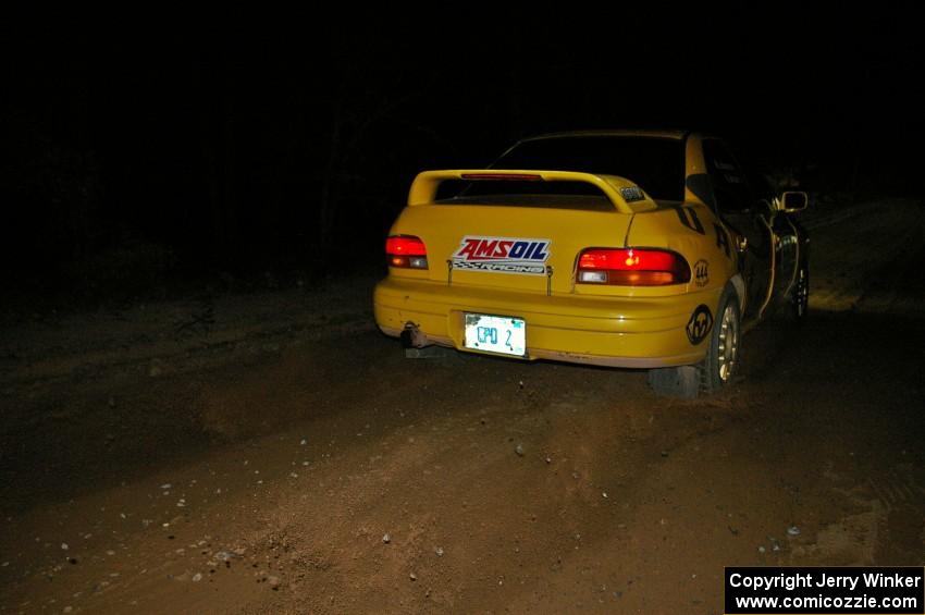 Kyle Sarasin / Mikael Johansson throttle their Subaru Impreza at the start of SS9, Menge Creek.