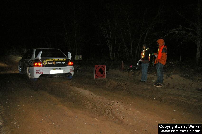 Andi Mancin / Maciej Wislawski power their Mitsubishi Evo 9 away from the start of Menge Creek, SS9.