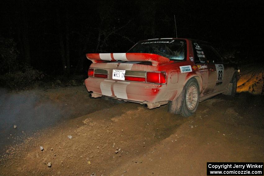 The Mark Utecht / Rob Bohn Ford Mustang leaves rooster-tails as it leaves the start of SS9, Menge Creek.