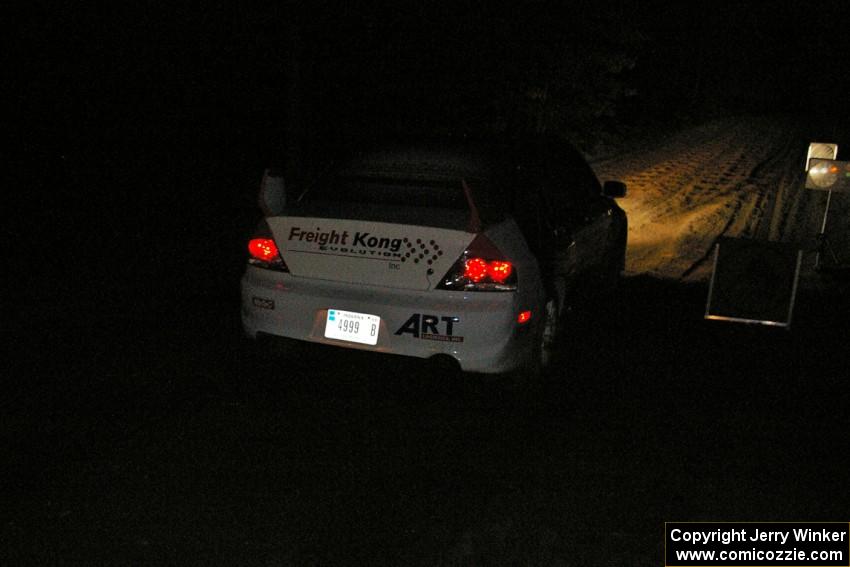 Arkadiusz Gruszka / Michal Chodan blasts away from the start of SS9, Menge Creek, in their Mitsubishi Lancer Evo 9.