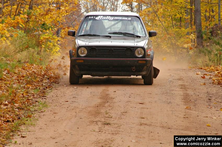 Dave Cizmas / Matt Himes blast their VW GTI into the finish of SS10, Gratiot Lake 1.