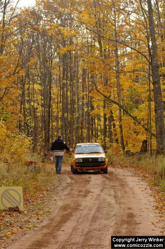 The Chad Eixenberger / Jay Luikart VW Golf checks into the finish of SS10, Gratiot Lake 1.