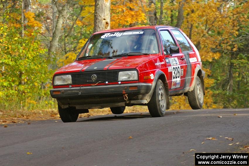 Mychal Summers / Ryan DesLaurier catch a little air in their VW Golf at the midpoint jump on Brockway 2, SS14.