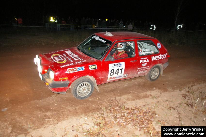 Daryn Chernick / Heidi Nunnemacher drift their VW GTI through the ruts at the spectator point on SS17, Gratiot Lake 2.