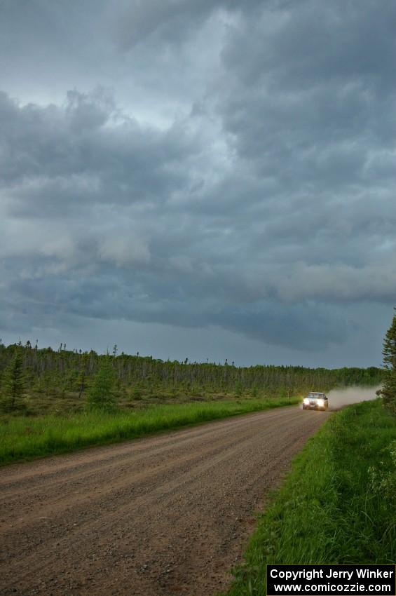 The '0' Subaru Legacy of Amy Springer checks out SS2 before the storm hits.