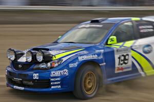 Travis Pastrana / Christian Edstrom drift their Subaru WRX STi in the SS1 speedway infield.(2)