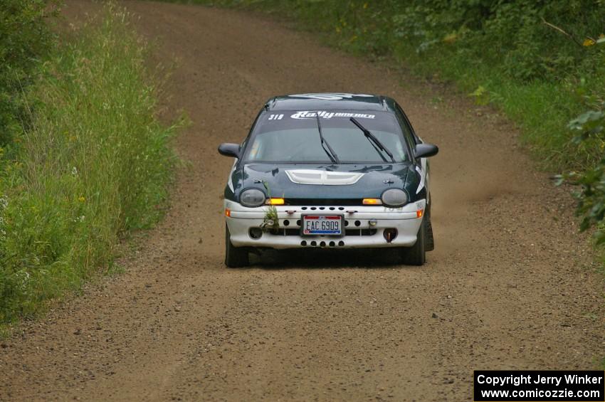 Chris Greenhouse / Don DeRose starting to feel the effects of the rain at the practice stage in their Plymouth Neon.