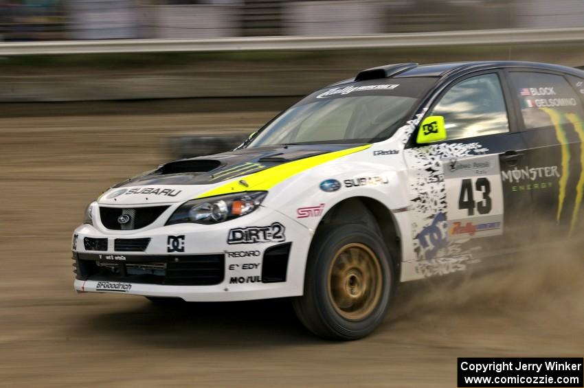 Ken Block / Alex Gelsomino drift through a left hander in their Subaru Impreza WRX STi on SS1.(1)