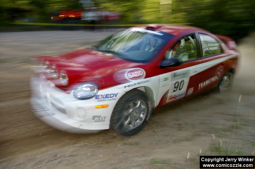 Lauchlin O'Sullivan / Karen Wagner drive their Dodge SRT-4 at speed through a fast left-hander on SS2.