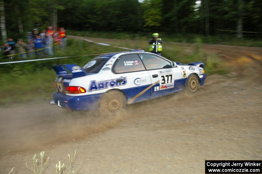 Mason Moyle / Scott Putnam set up for the uphill hairpin at the SS4 spectator point in their Subaru Impreza.