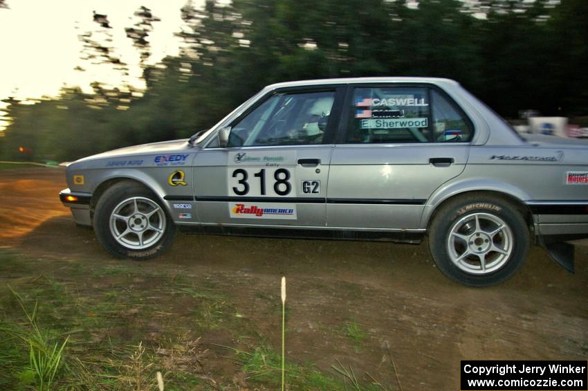 Bill Caswell / Elliot Sherwood in their BMW 318i head uphill at the spectator hairpin on SS4.