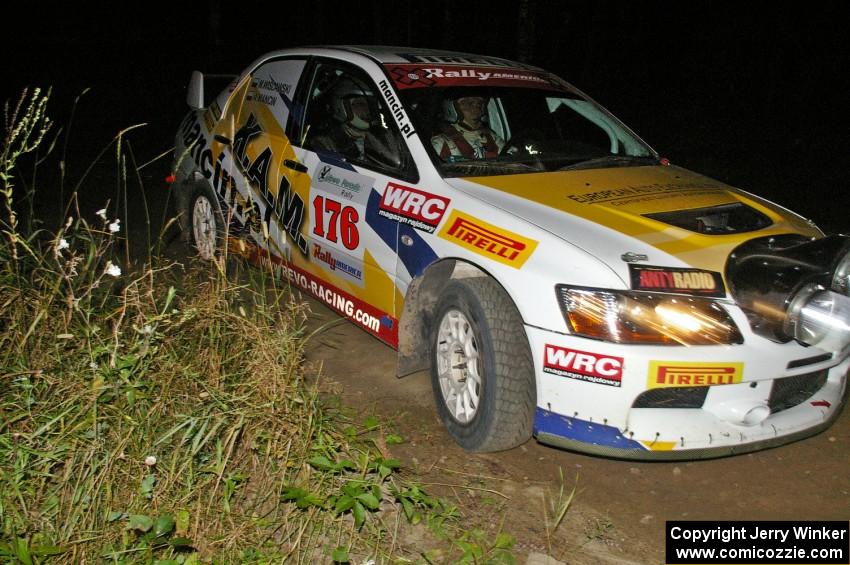 Andi Mancin / Maciej Wislawski in their Mitsubishi Lancer Evo 9 through a right-hander on SS6.