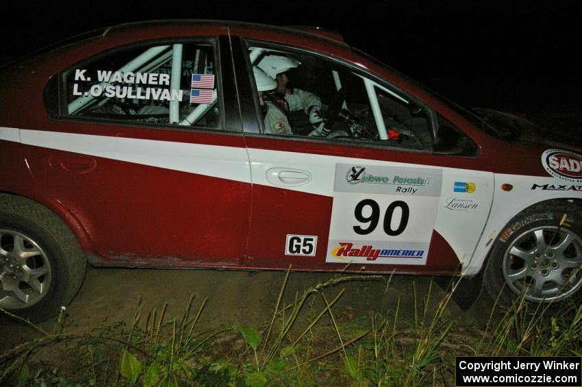 Lauchlin O'Sullivan / Karen Wagner drive their Dodge SRT-4 at speed through a right hander on SS6.