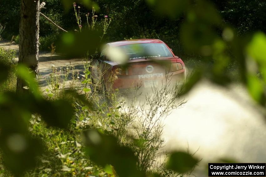 Mark Utecht / Rob Bohn blast down the 3/4 mile straight on SS11, Indian Creek, in their Ford Mustang.