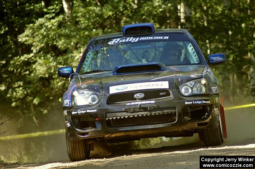 Carl Siegler / David Goodman in their Subaru WRX STi at a right hander on SS11.