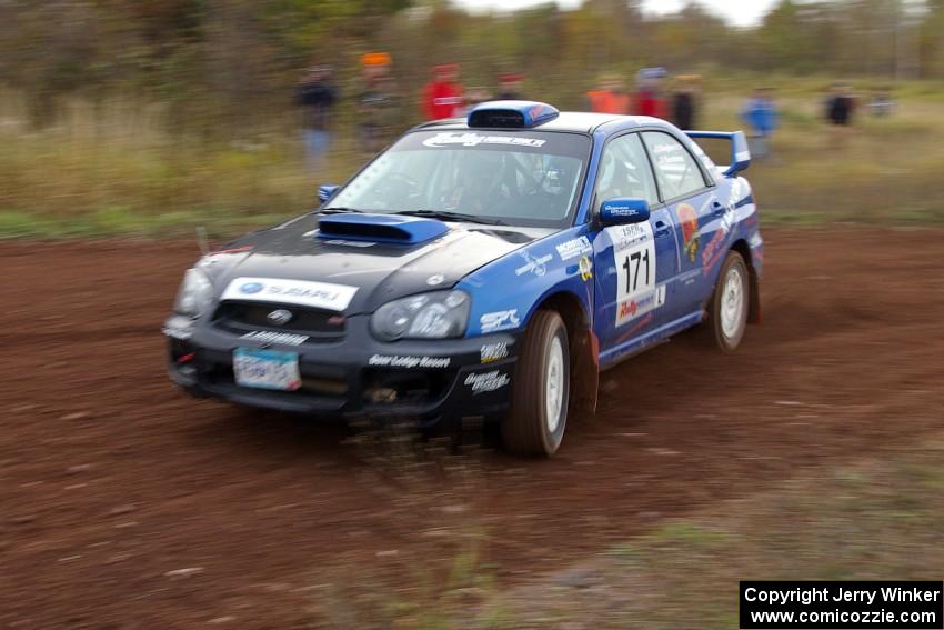 Carl Siegler / David Goodman drift through a tight corner on the practice stage in their Subaru WRX STi.