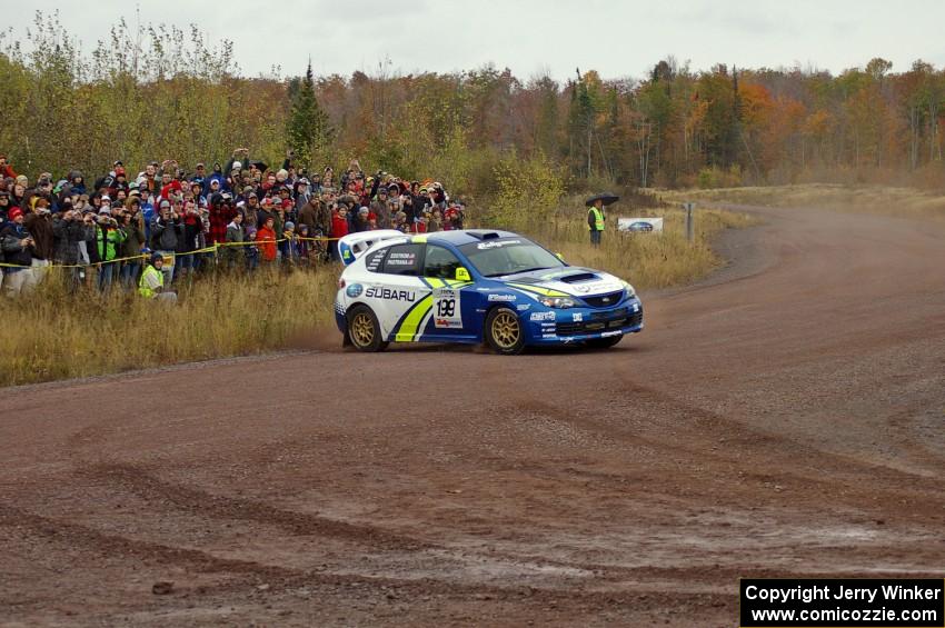 Travis Pastrana / Christian Edstrom throw their Subaru WRX STi hard into the spectator corner on Green Acres, SS1.