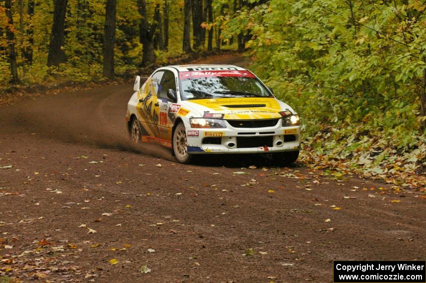 Andi Mancin / Maciej Wislawski drift their Mitsubishi Lancer Evo 9 through one of the last corners of Beacon Hill, SS2.