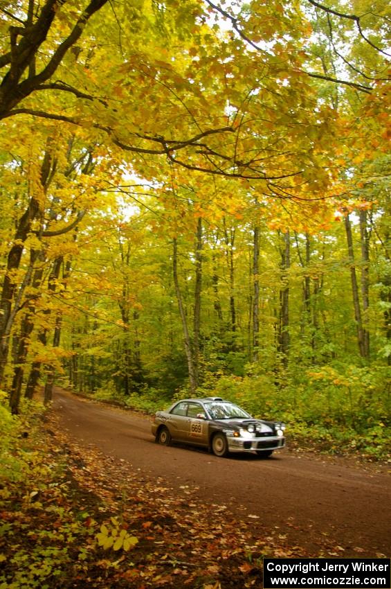 Evan Cline / Jason Grahn drift through a scenic sweeper near the finish of Beacon Hill, SS2, in their Subaru Impreza.