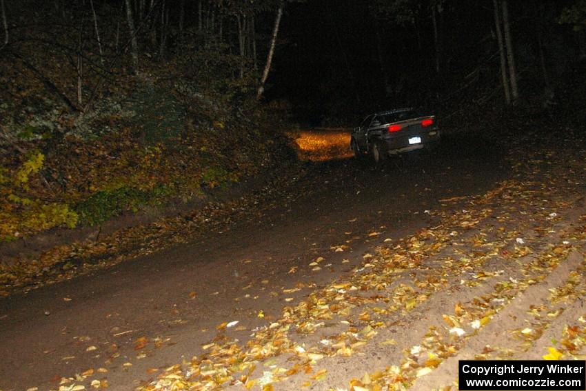 Matt Huuki / Tom Immonen rocket downhill in their Eagle Talon on Menge Creek, SS9.