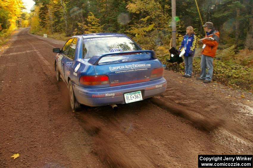 Kazimierz Pudelek / Michal Nawracaj blast away fro the start of Delaware 1, SS11, in their Subaru Impreza.