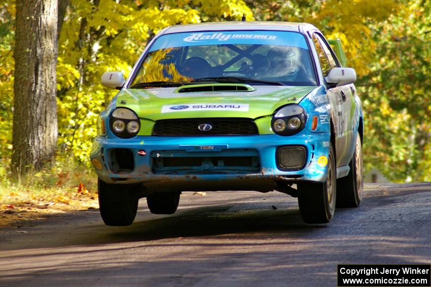 Pete Hascher / Scott Rhoades take it easy at the midpoint jump on SS13, Brockway 1, in their Subaru WRX.