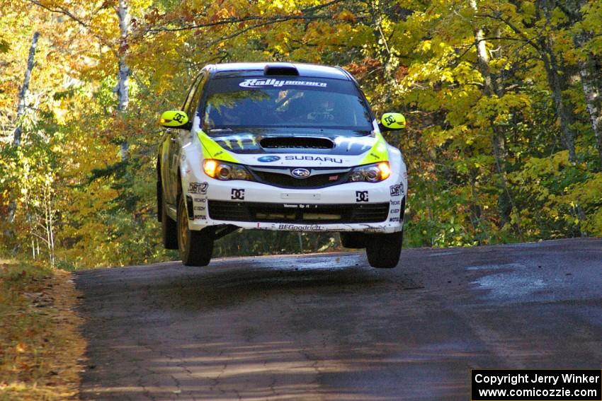 Ken Block / Alex Gelsomino catch air at the midpoint jump on Brockway Mtn. 2, SS16, in their Subaru WRX STi.