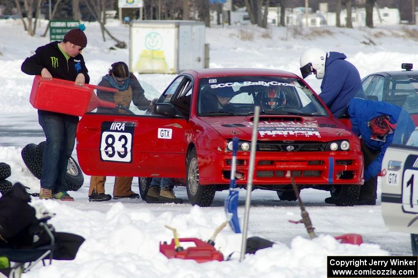 Mark Utecht / Jay Luehmann Subaru Impreza at the driver's change.