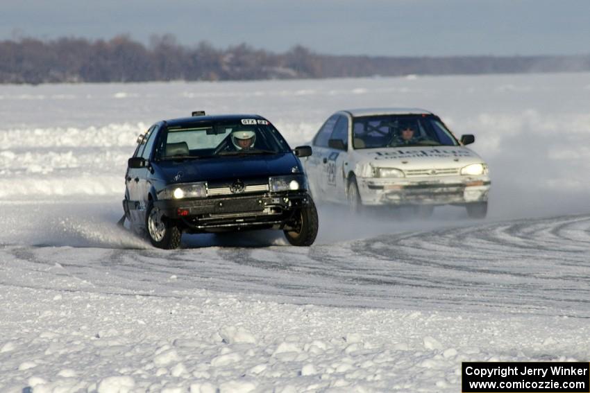 The Ty Saiki / Mike Ehleringer VW Passat is chased by the Kevin Beck / Brent Carlson Subaru Impreza.