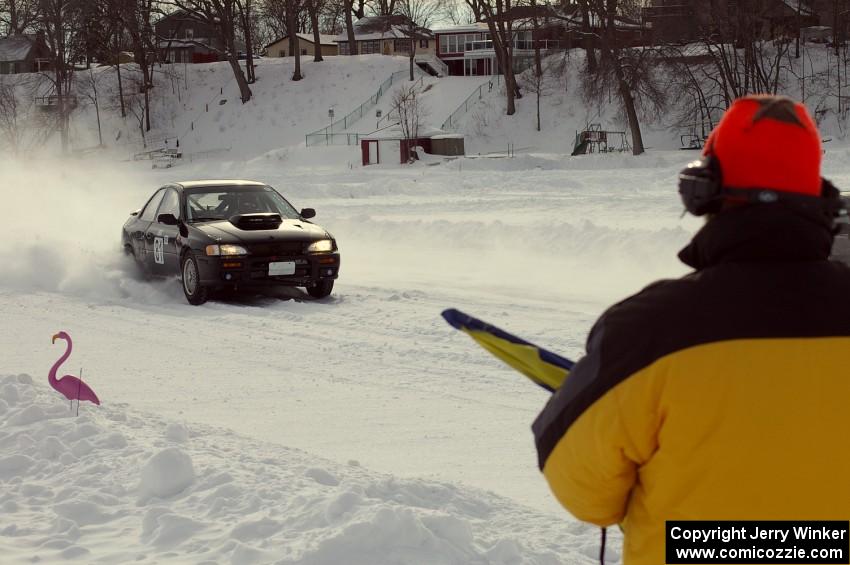 Bob Kosky eyes the Tim Stone / Dan Gervais / Ryan Rose Subaru Impreza