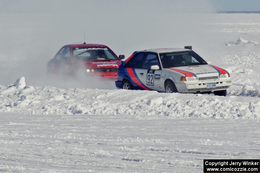 Chris Orr / Terry Orr Mazda 323GTX ahead of the Mark Utecht / Tom Fuehrer Subaru Impreza