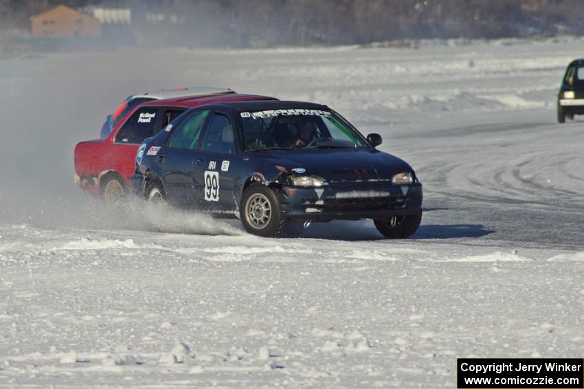 Ryan Hammond / Kyle Laursen Honda Civic and Pete Tavenier / Bruce Powell BMW 318i