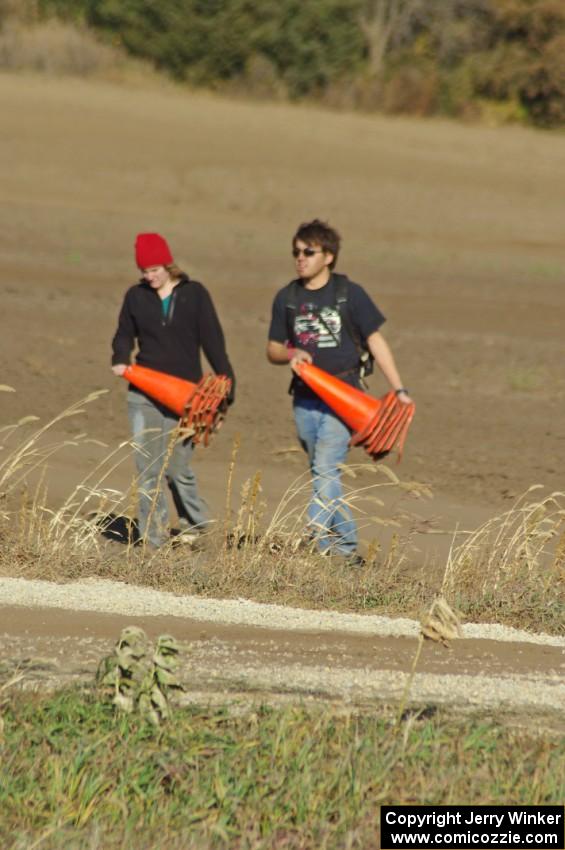 ??? and Martin Asao help stack the cones at the close of the racing day.