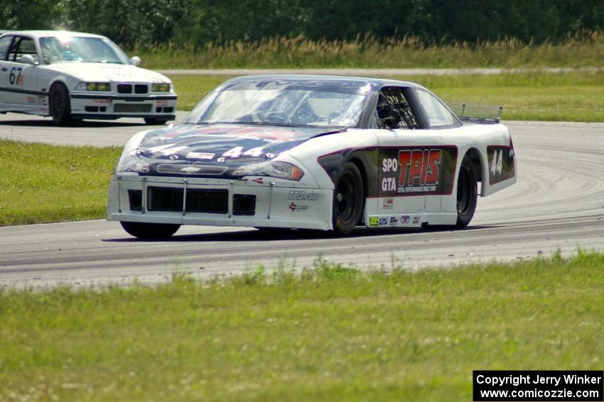 John Cottrell's SPO Chevy Monte Carlo and Rick Iverson's ITE BMW M3