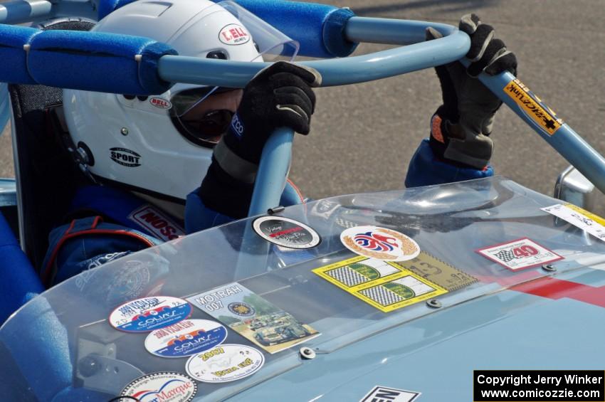 Randy Byboth sits in his Austin-Healey Sprite