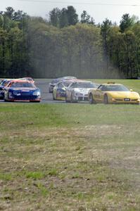 The field behind the pace car on the pace lap.