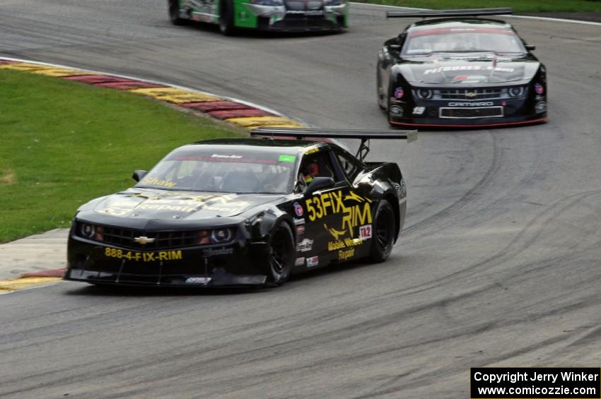 Mel Shaw's Chevy Camaro, Ricky Sanders's Chevy Camaro and Scott Ferguson's Pontiac GTO.R