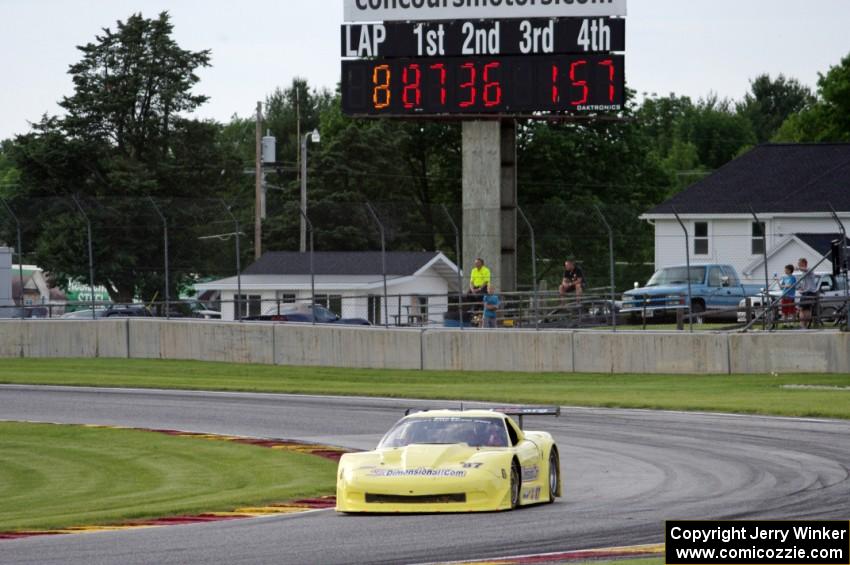 Doug Peterson's Chevy Corvette leads after eight laps