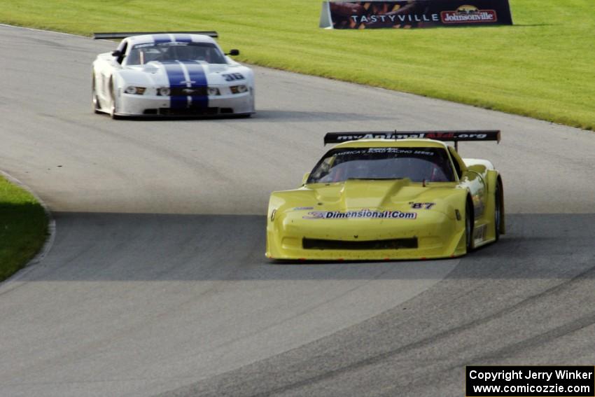 Doug Peterson's Chevy Corvette leads Cliff Ebben's Ford Mustang