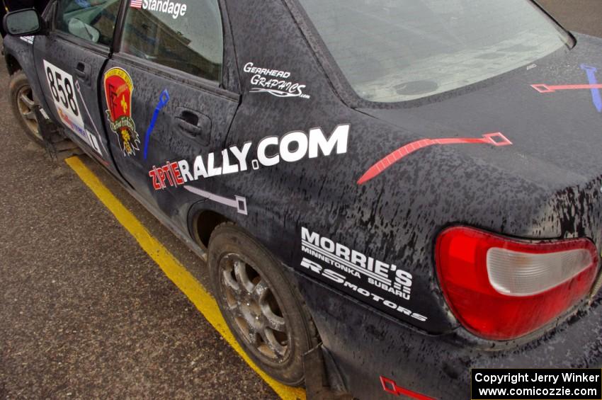 Rain starts to fall on the Anthony Israelson / Jason Standage Subaru Impreza.