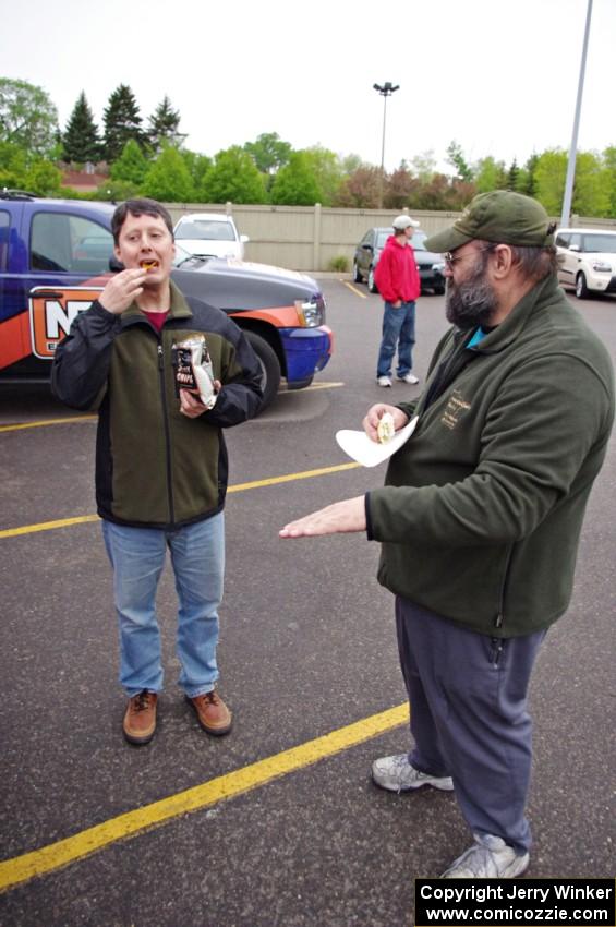 Jim Cox and Pete Winters eat some vittles at Rallyfest.