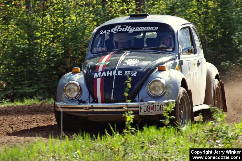 The Mark Huebbe / John Huebbe VW Beetle through a sweeper on stage three.