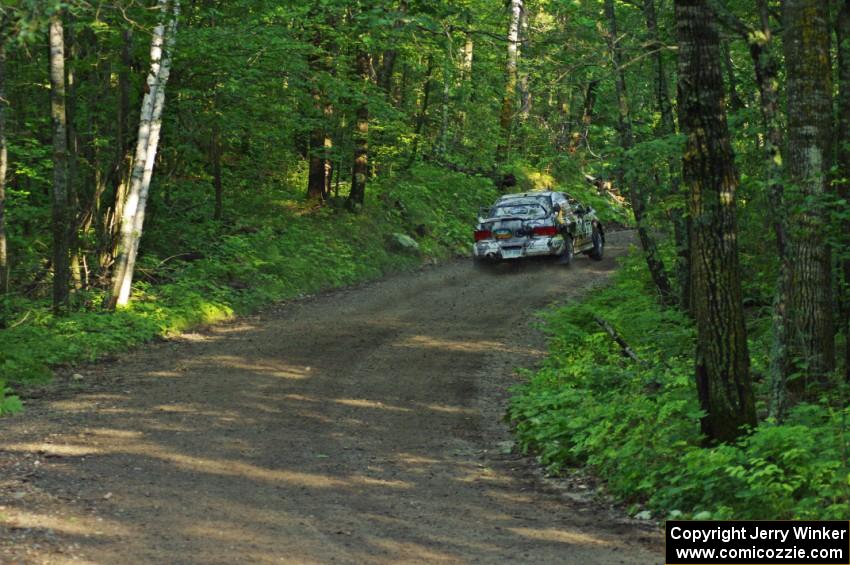 Mason Moyle / Gary Barton in their Subaru Impreza 2.5RS on SS1