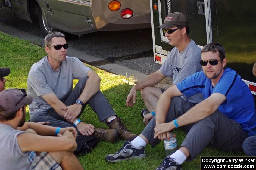 John Huebbe, Jim Cox and Mark Huebbe relax in the shade at parc expose.